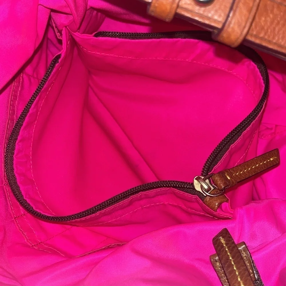 Dooney & Bourke boho sak purse in red with hot pink interior 1975 tag
